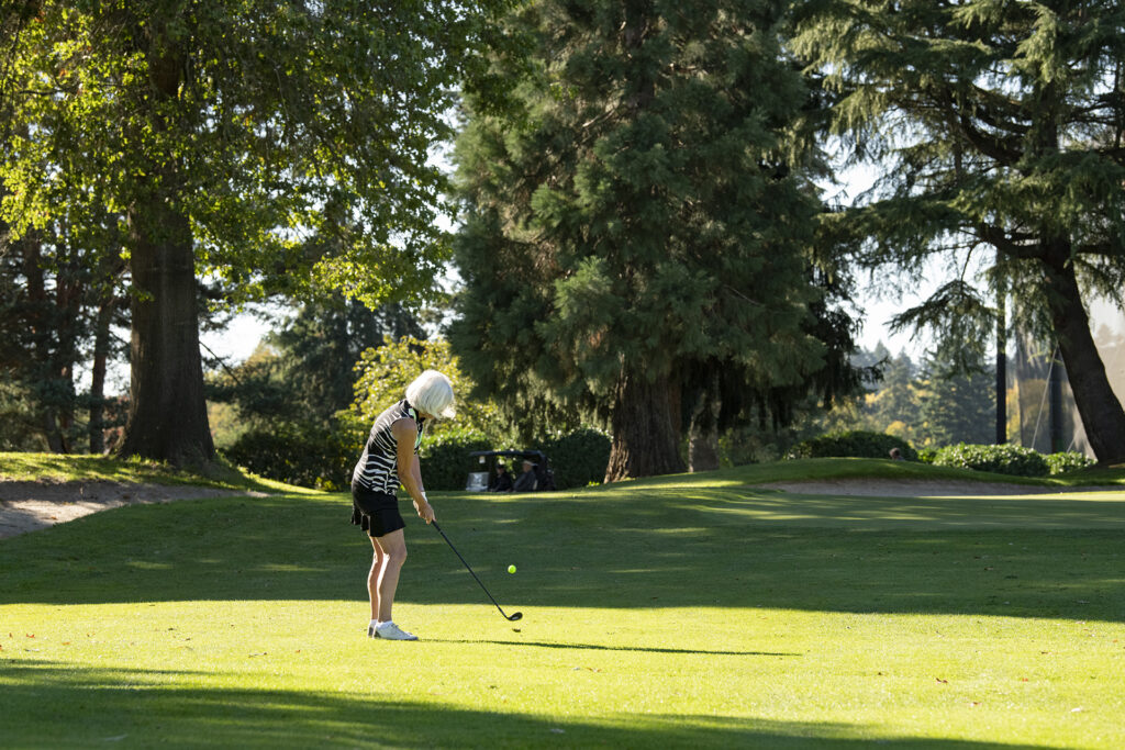 Woman golfing at Charbonneau Golf Club