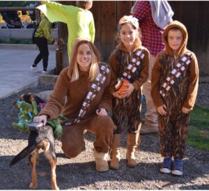 A family dressed in Chewbacca costumes
