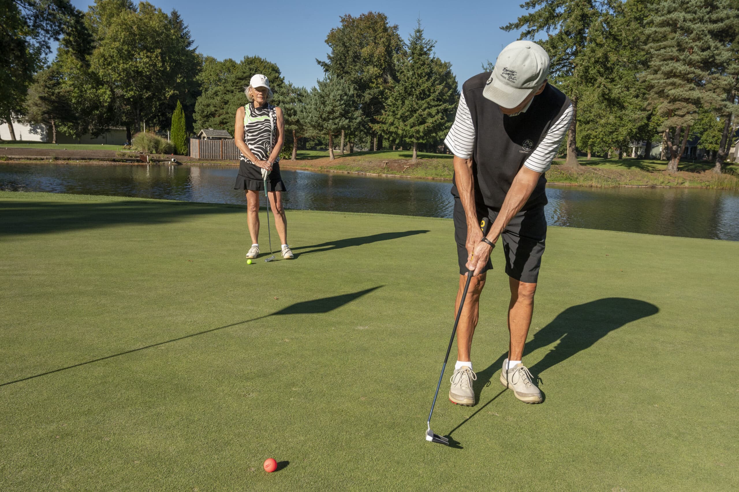 photo of golfers putting at Charbonneau Golf Club in Wilsonville, Oregon