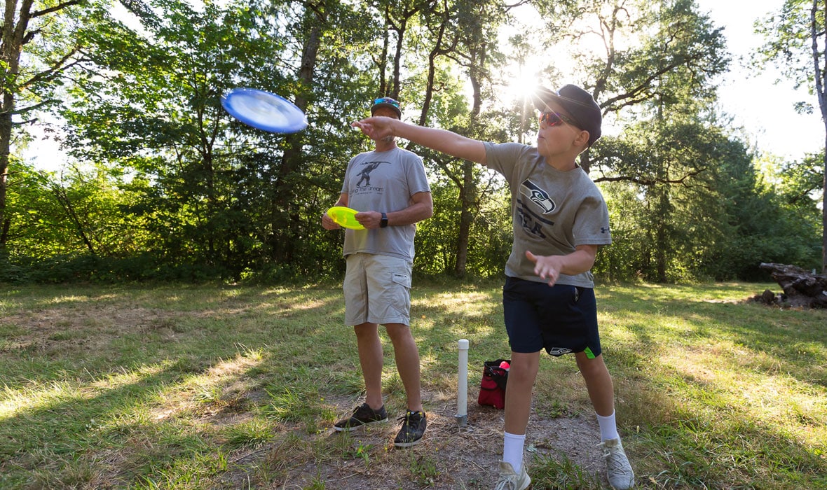 Play disc golf at Champoeg State Heritage Area or at Memorial Park in Wilsonville, Oregon
