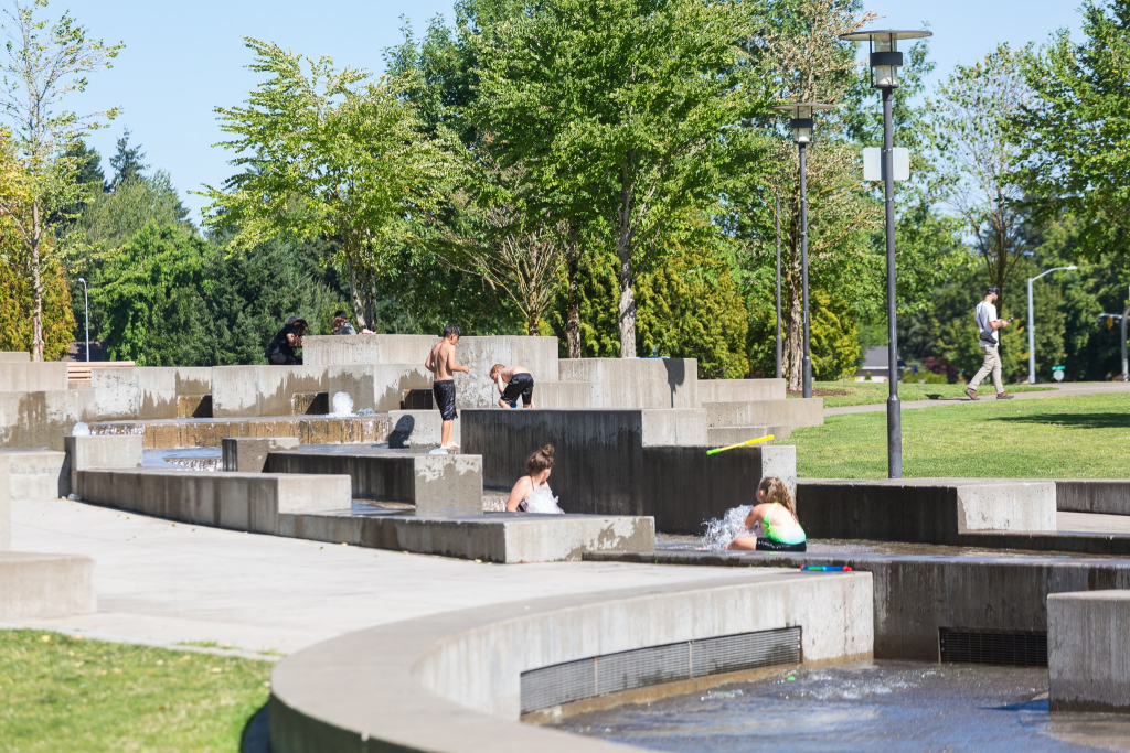 Children playing at the water feature at Town Center Park