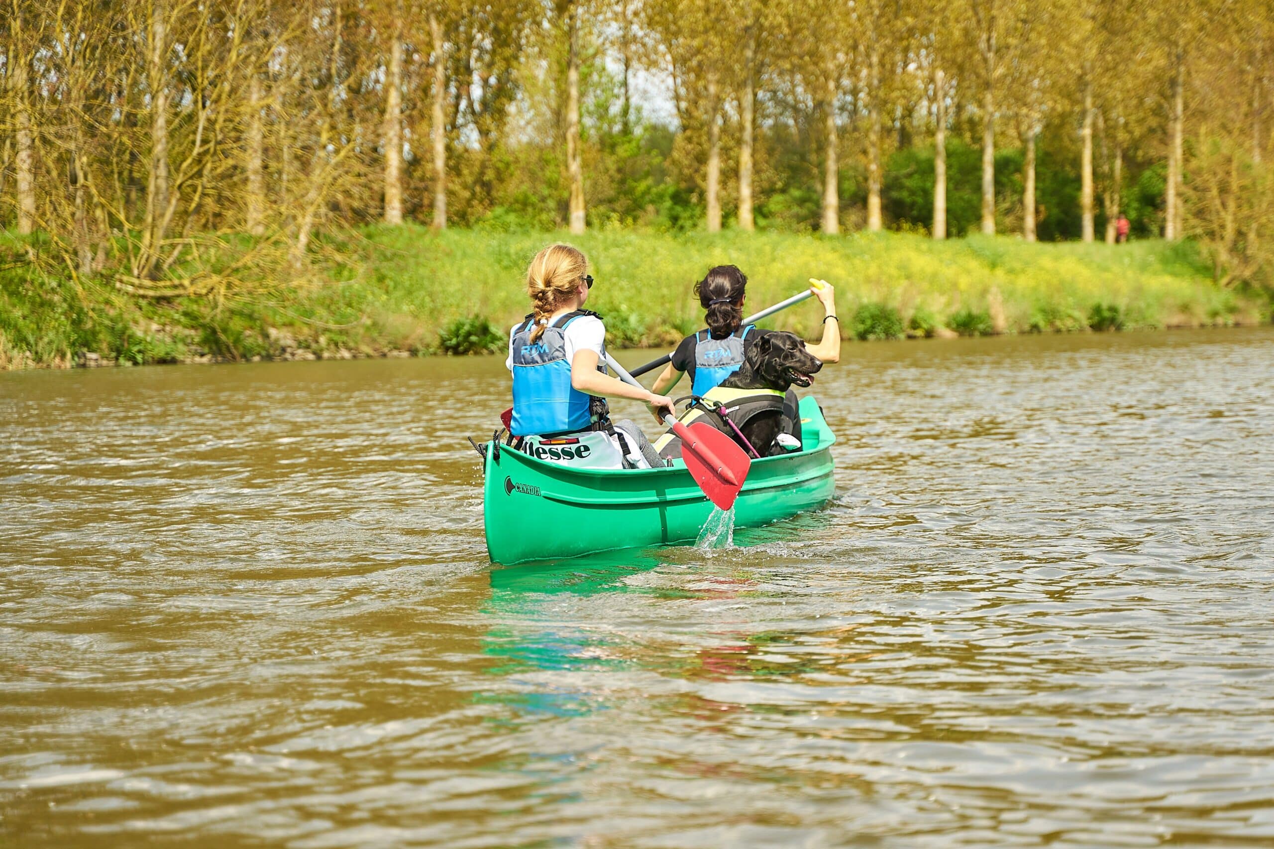 Two people in a kayak on the Willamette River near Wilsonville, Oregon