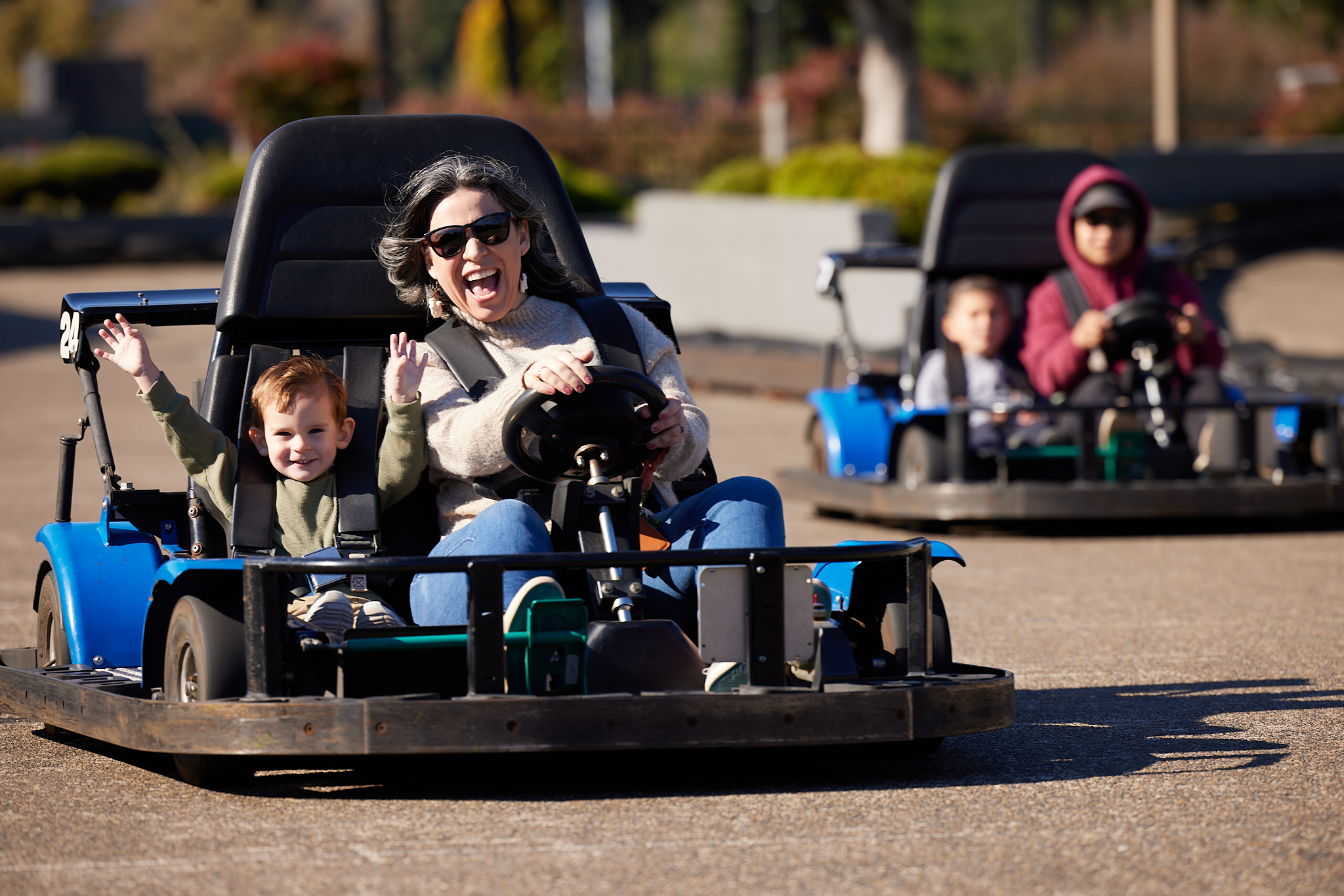 Family on go-karts at Bullwinkles