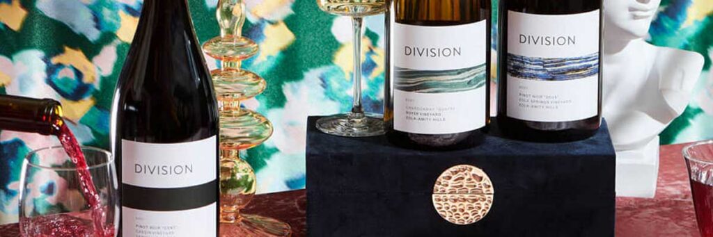 photo of Division Winemaking Co. wine being poured into wine glass