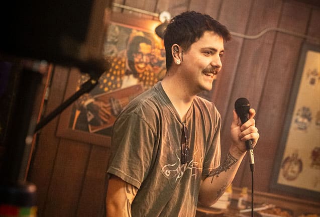 photo of Mill City Karaoke participant singing