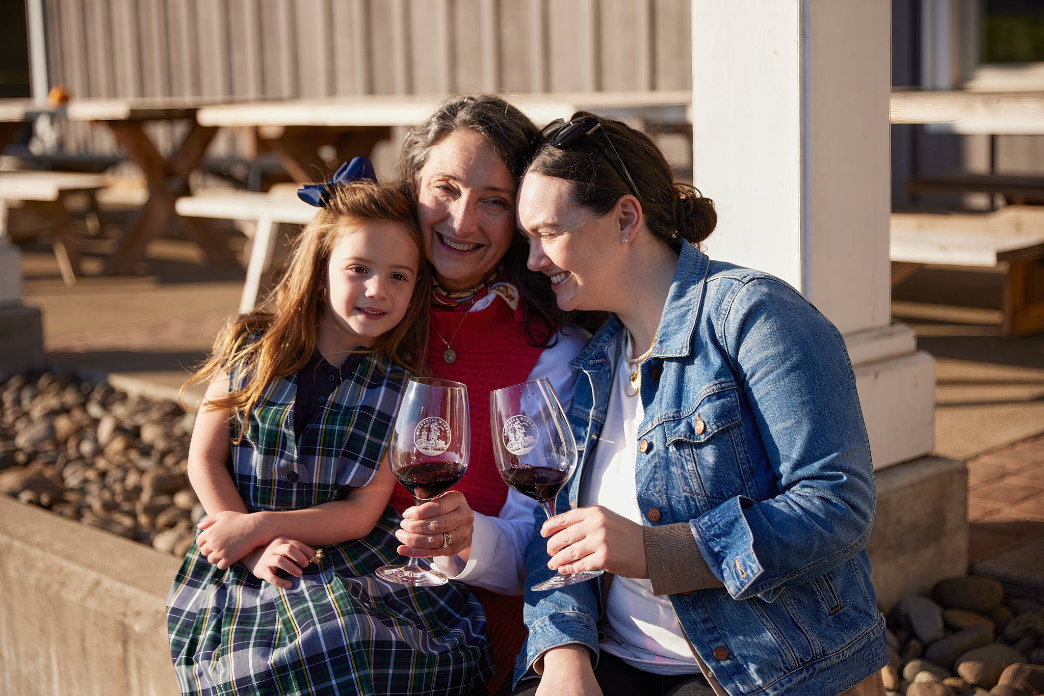 Three generations of women enjoying each others company at Lady Hill Winery near Wilsonville, Oregon