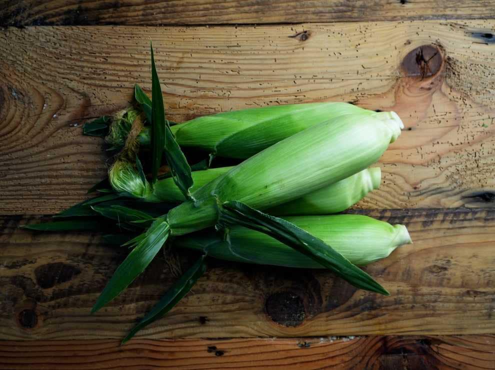 photo of corn being prepped for tamales at The Kitchen at Middleground Farms in Wilsonville, Oregon